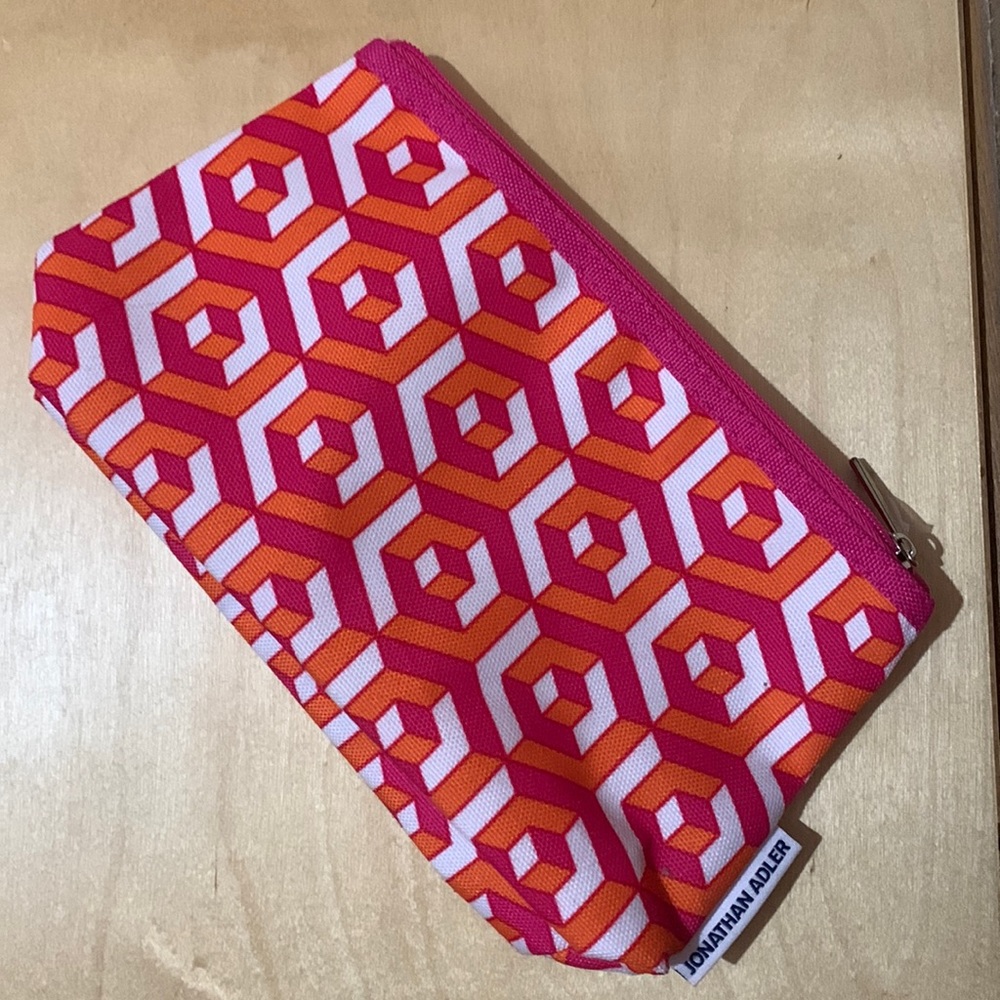 Jonathan Alder for Clinique pouch. Geometric print. Pink orange white